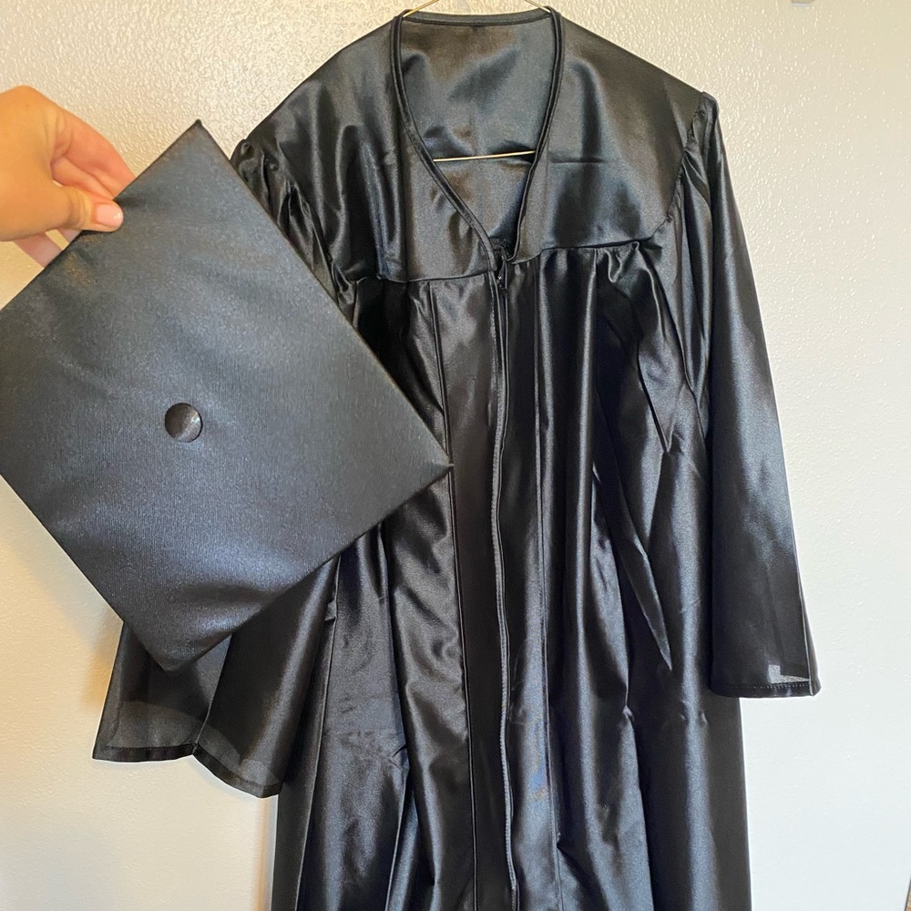 Black graduation cap and gown